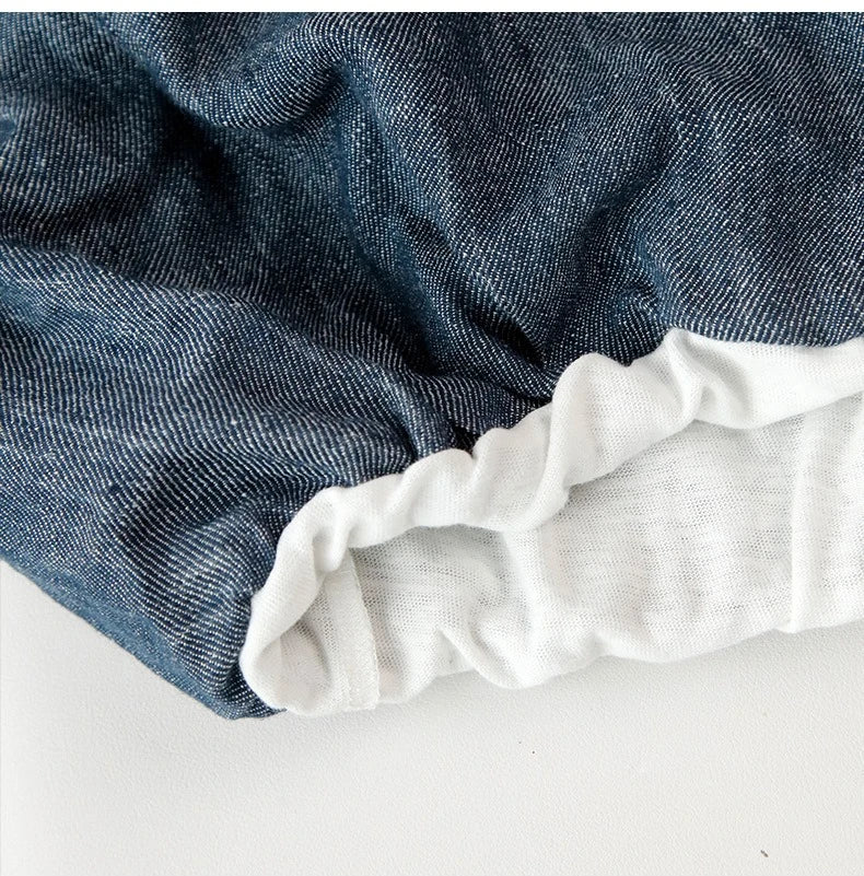 Linen Deep V-Neck Shirt Paired With A White Vest